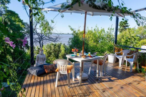 Hermosa casa, terraza al río, Jacuzzi climatizado